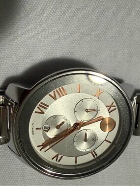Movado Silver Watch with Rose Gold Accents